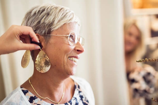 woman after getting ears pierced