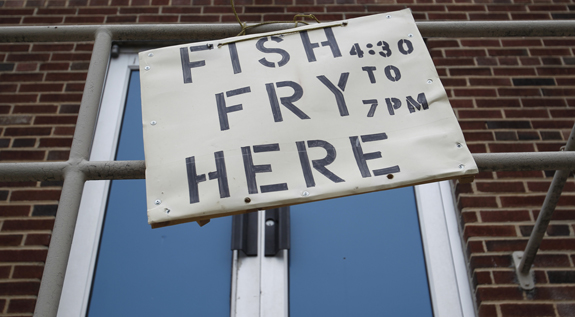 Sign hangs ouside parish hall before Friday fish fry at Pennsylvania church