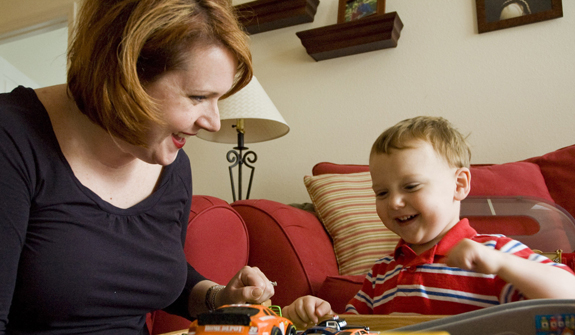 MOTHER, SON PLAY WITH CARS AT THEIR TENNESSEE HOME