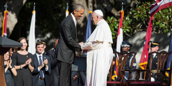 U.S. President Barack Obama greets Pope Francis during an arrival ceremony on South Lawn of White House