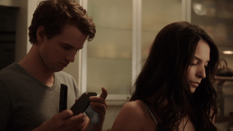 He cleans up nice, but for a brilliant physicist he sure is confounded by a smartphone.