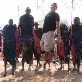 Dr. Bob Siegel & Maasai villagers in the famous Siegel jump