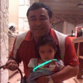 Rowland Reyna and child