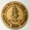 Round bronze Firestone medal, image of the Stanford tree 