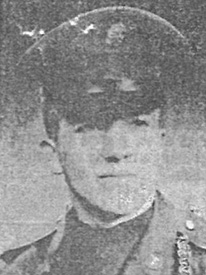 Attached photograph of Specialist Fifth Class De Lange