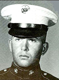 Attached photograph of Gunnery Sergeant Fischer