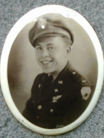 Attached photograph of Flight Officer Schuster