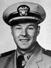 Attached photograph of Lieutenant Commander Lyman