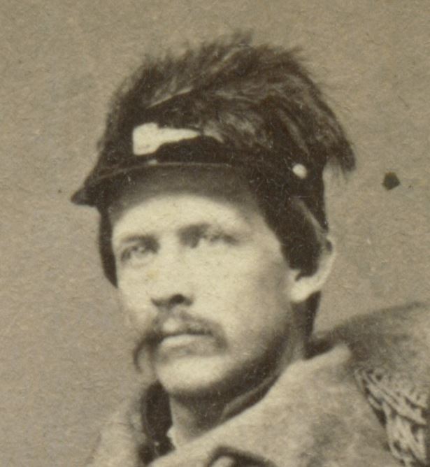 Attached photograph of Sergeant Staples