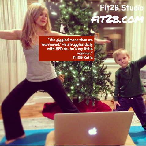 "The family that yoga's together… just playing around at the Warrior I workout with my eldest kiddo."