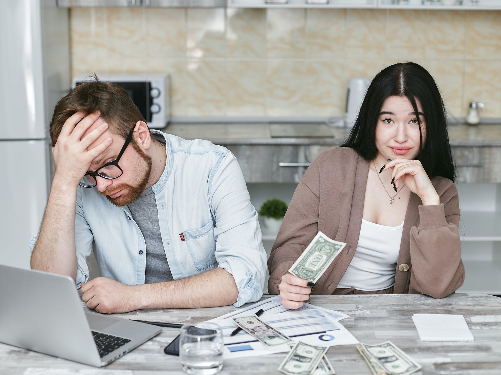 a man and woman doing budgeting