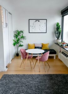 contemporary room interior with furniture and carpet on floor