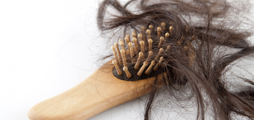 Close-up,Of,A,Brush,With,Lost,Hair,On,It,,On