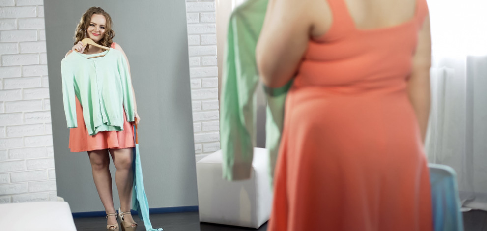 Plump,Girl,Choosing,Clothes,In,Dressing,Room,,Plus,Size,Fashion,