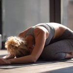 Yoga expert shares 4 asanas to improve thyroid health Halasana to shoulder stand