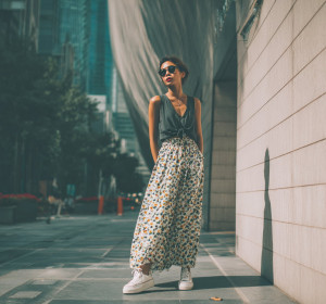 The Maxi Skirt-Sneaker Pairing is Winter's Most Practical Power Combo
