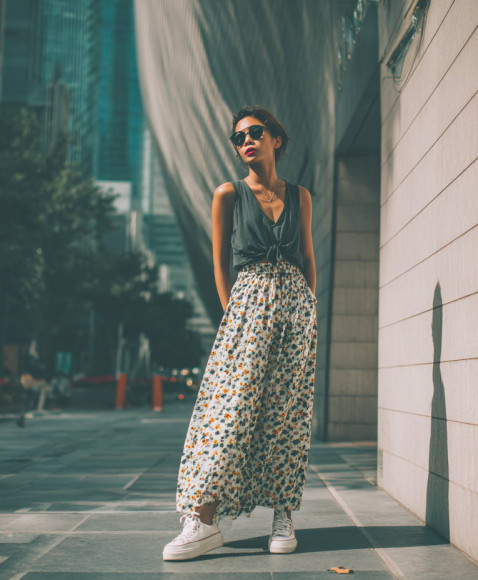 The Maxi Skirt-Sneaker Pairing is Winter's Most Practical Power Combo