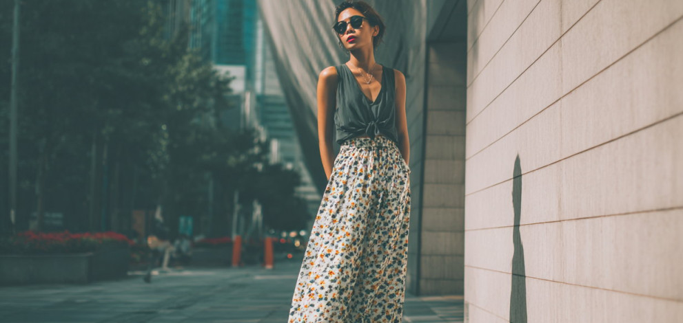 The Maxi Skirt-Sneaker Pairing is Winter's Most Practical Power Combo