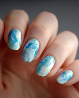 What Are 'Dolphin Skin' Nails, The Ultra-Shiny Grey Trend Set To Take Over 2026