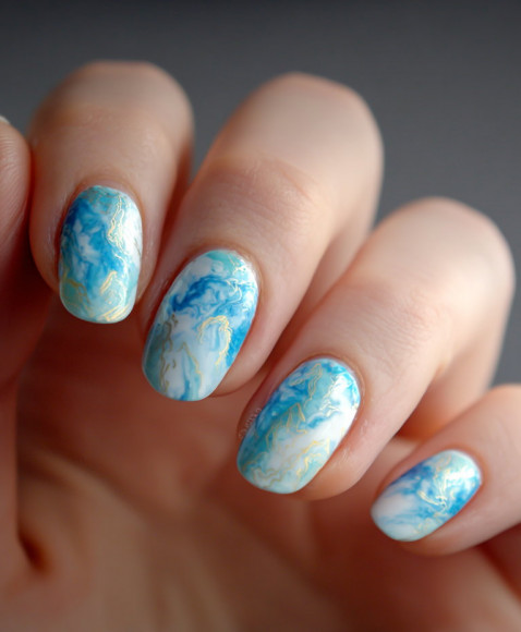 What Are 'Dolphin Skin' Nails, The Ultra-Shiny Grey Trend Set To Take Over 2026