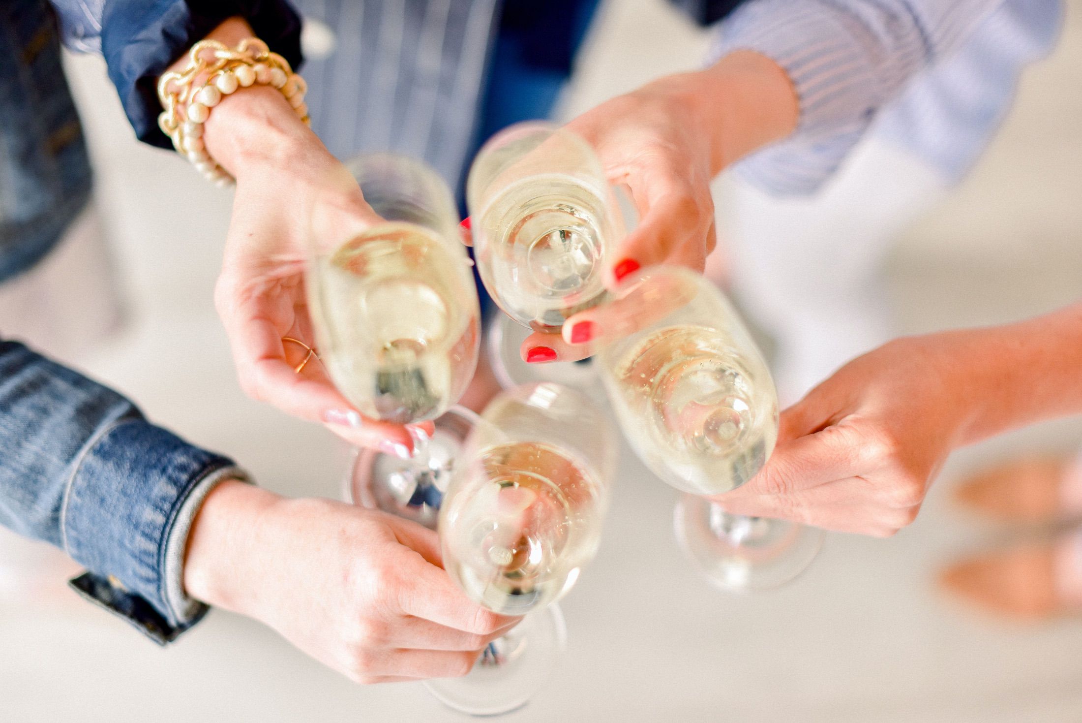 DEY_1828 RPC employees cheering with champagne