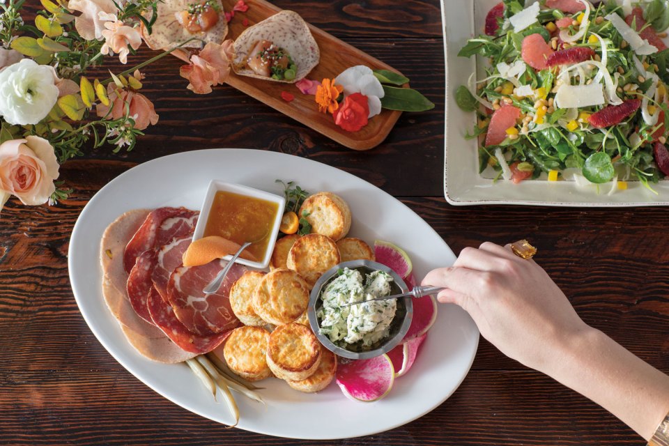 PBG_0617_ReceptionStyle_Scene2_170301_PDXBG_0250_RETOUCHED-web three plates of food on table with flower arrangement