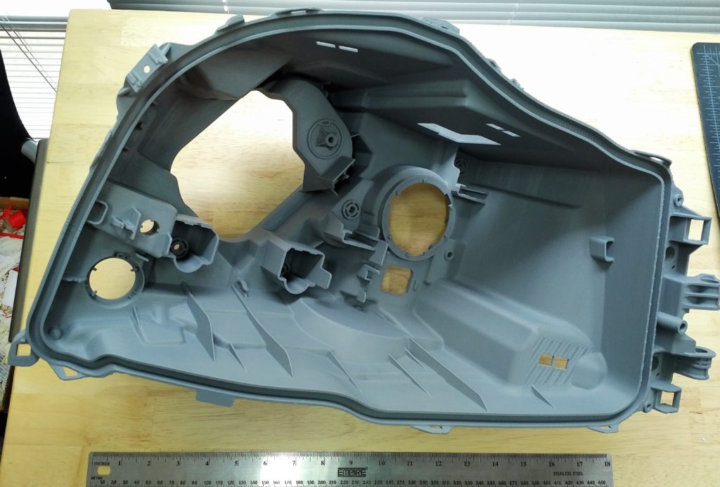 Headlight_bucket ABS headlight bucket in grey 3D printed by 3ntr