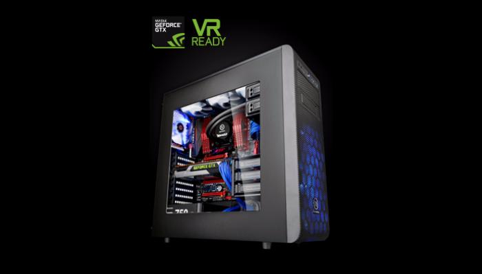 Black custom gaming PC tower with a clear side panel showing illuminated components and a VR Ready badge.
