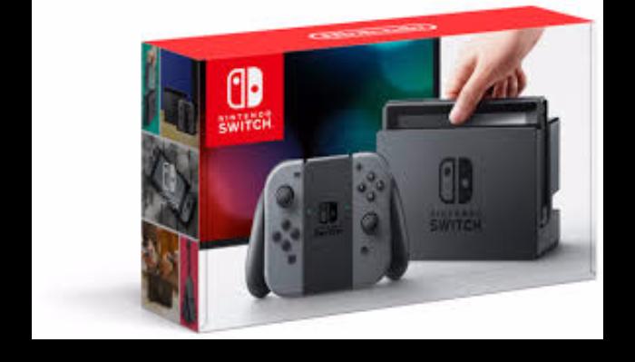 Nintendo Switch console box featuring grey Joy-Con controllers and dock.