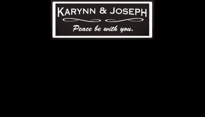 Black banner with white text reading "KARYNN & JOSEPH" above decorative swirls and "Peace be with you."
