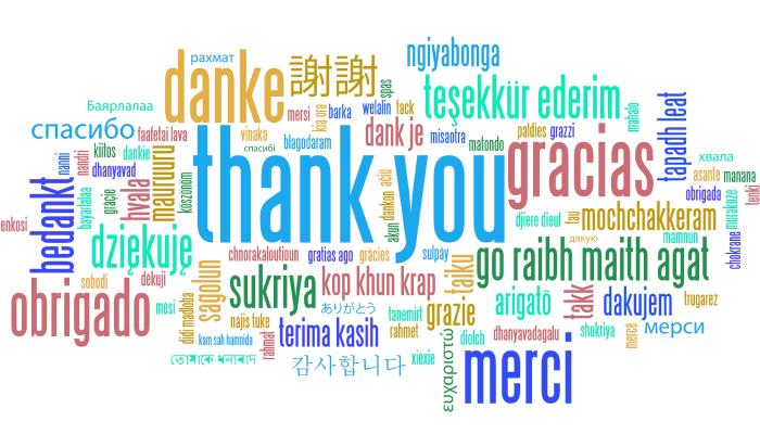 A colorful word cloud featuring "thank you" written in many different languages on a white background.