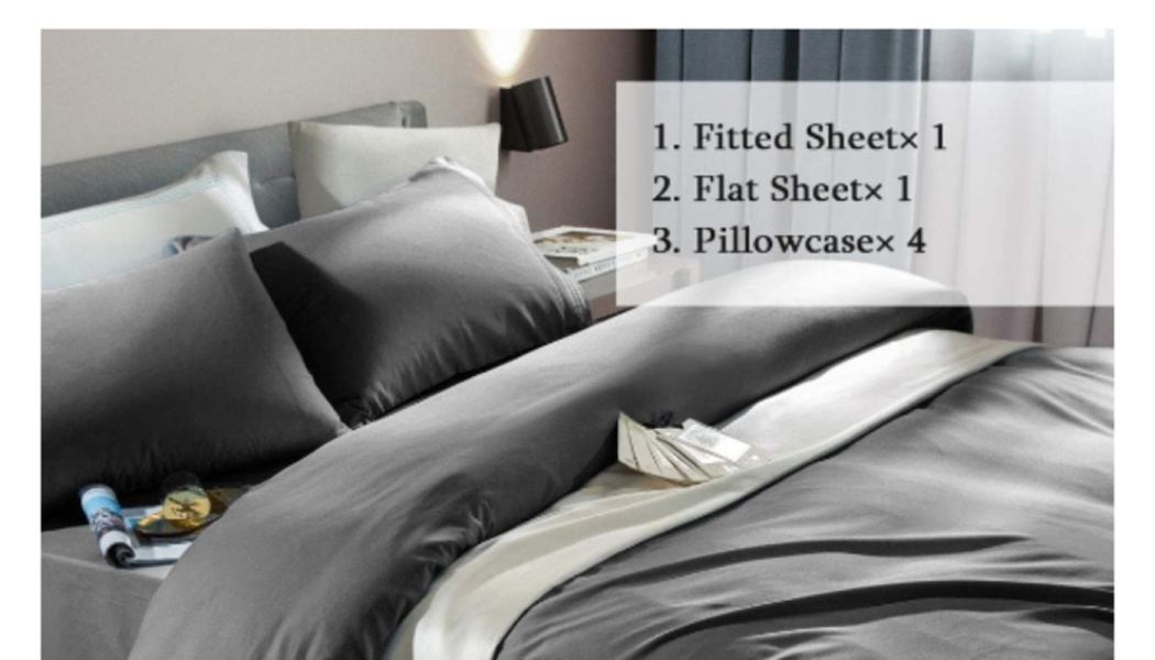 Dark grey bedding set on a bed, listing included items: 1 fitted sheet, 1 flat sheet, and 4 pillowcases.