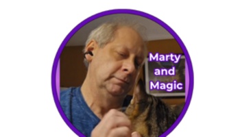 Man gently petting a tabby cat in a purple circular frame with the text "Marty and Magic".