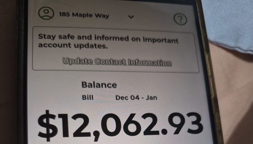 Phone screen showing a bill balance of $12,062.93 for an account at 185 Maple Way.
