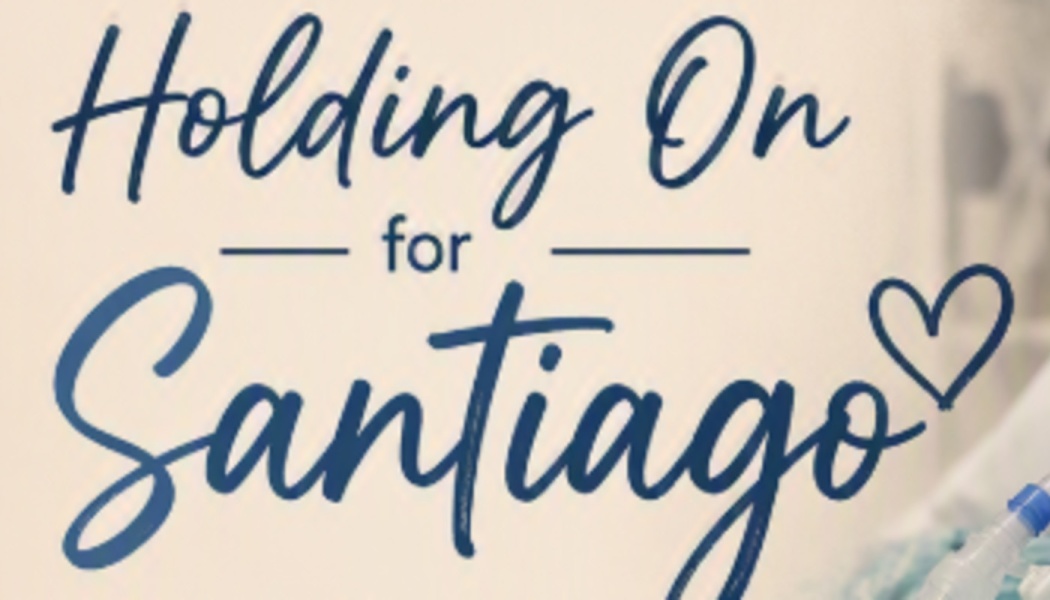 Blue script text reading "Holding On for Santiago" with a small heart outline next to the name.