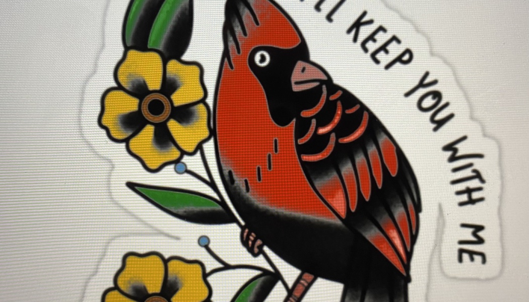 Traditional tattoo-style sticker of a red cardinal with yellow flowers and text reading "I'll keep you with me."