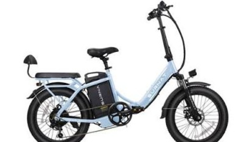 Light blue electric bicycle with a step-through frame, fat tires, central battery pack, and padded rear seat.