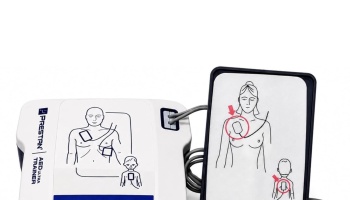 Prestan AED UltraTrainer device and connected training pads featuring illustrated electrode placement diagrams.