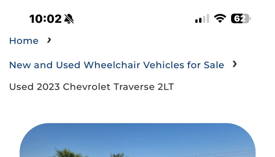 Website screenshot listing a Used 2023 Chevrolet Traverse 2LT under wheelchair vehicles for sale.