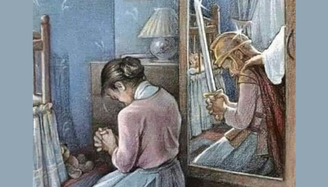 A woman kneeling in prayer beside a bed, her mirror reflection showing an armored warrior holding a sword.