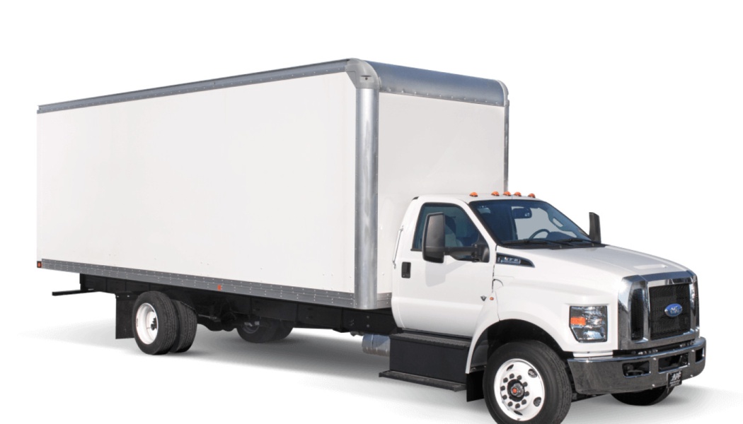 Large white Ford commercial box truck on a plain white background.
