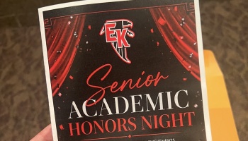 Senior Academic Honors Night program card featuring an EK falcon logo, red curtains, and confetti.
