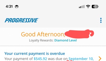 Progressive account dashboard showing an overdue payment notice of $545.92 due on September 10.