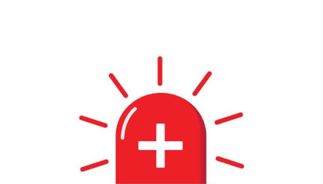 Red emergency light icon with a white cross and radiating light beams.