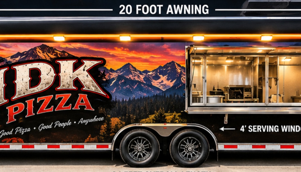 IDK Pizza food trailer featuring scenic mountain graphics, a 20-foot awning, and an open serving window.