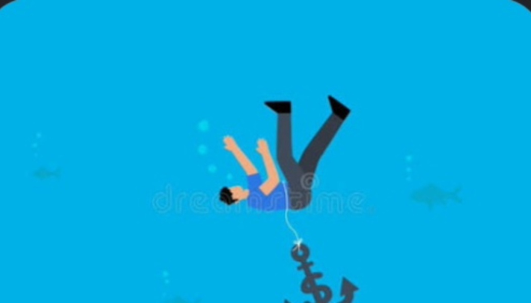A man sinking underwater, pulled down by a heavy dollar-sign anchor.