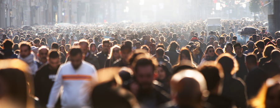 Blurred crowd of unrecognizable at the street