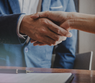 Two hands shaking like they're making a deal