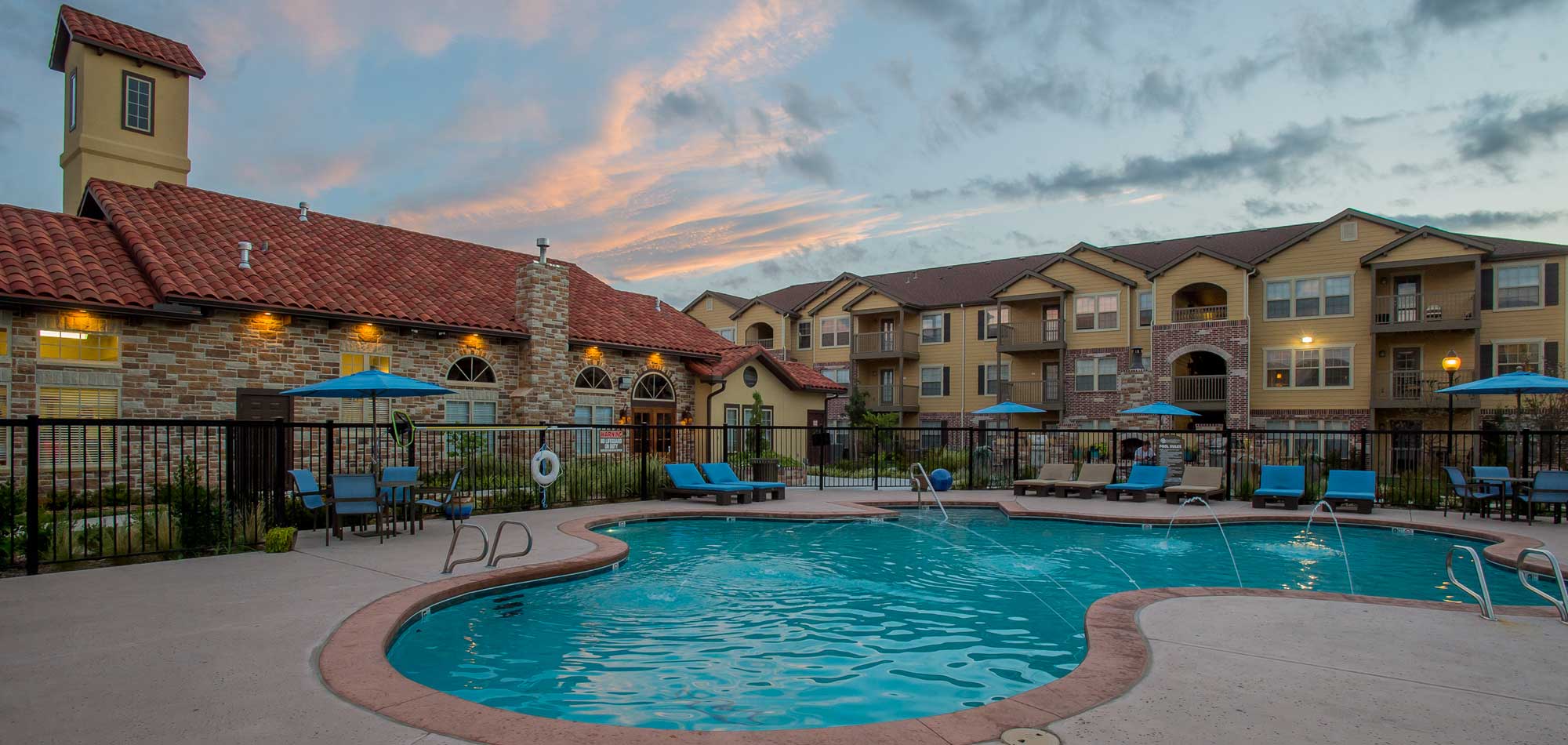 The sparkling swimming pool at our apartments in Wichita will enchant you