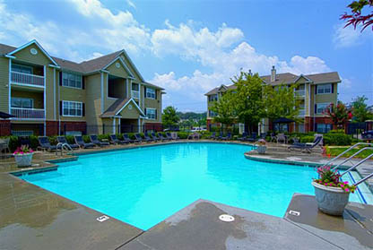 Host movie nights in a personal screening room at apartments in Knoxville, Tennessee